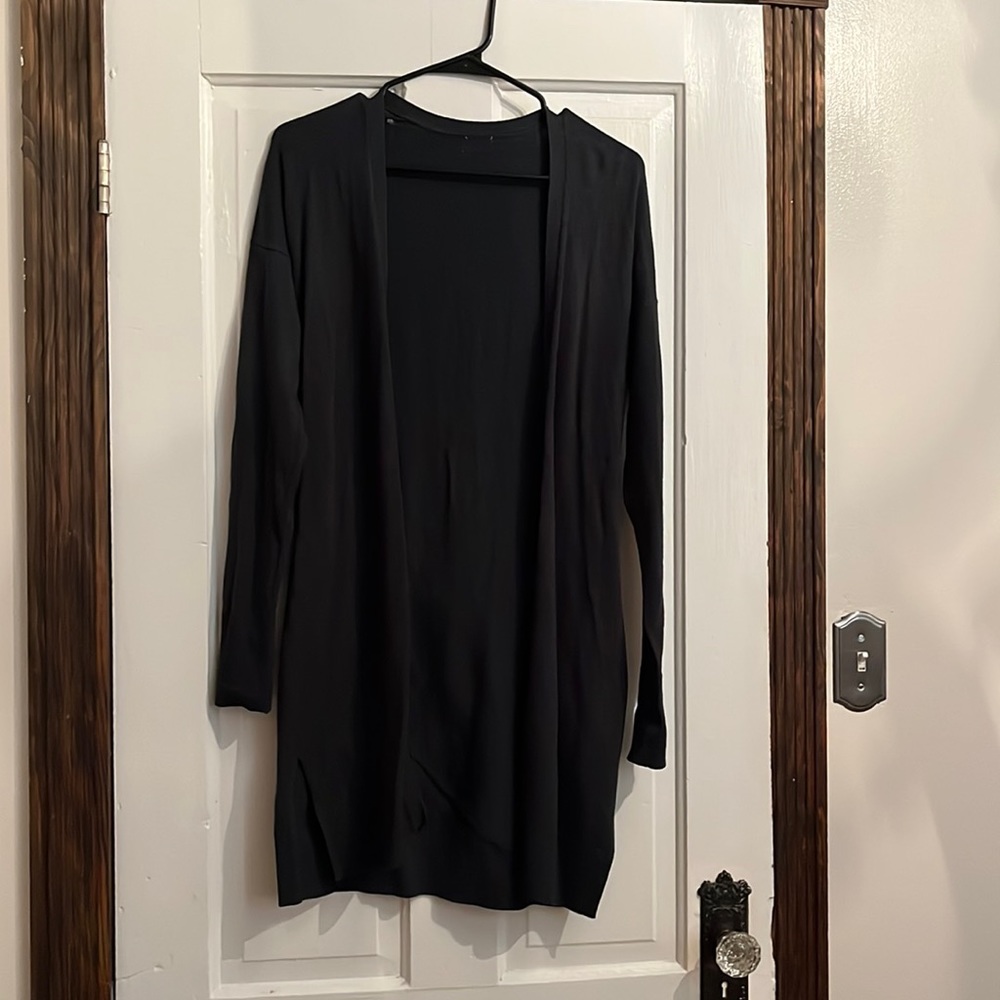 Worn once xs cardigan with back detail, beautiful rich green/blue color